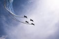 Airplanes on airshow. Aerobatic team performs flight at air show in Krakow, Poland.