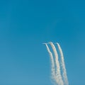 Airplanes on airshow. Aerobatic team performs flight