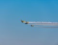 Airplanes on airshow. Aerobatic team performs flight