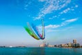 Airplanes flying above Abu Dhabi skyline for the UAE national day celebration airshow Royalty Free Stock Photo