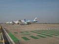 Airplanes parking at Siem Reap International Airport tarmac in the morning Royalty Free Stock Photo