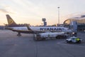 An airplane parked for boarding on Henri Coanda International Airport