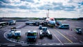 Airport. Airplane is being serviced by the ground crew