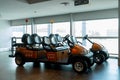 Airport battery powered vehicles for transporting passengers around the airport building. Modern airport service