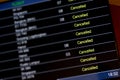 Airport billboard panel with cancelled flights during coronavirus covid-19 epidemic Royalty Free Stock Photo