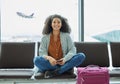 Airport, black woman and portrait of a young person at flight terminal waiting for airplane travel. Passport document Royalty Free Stock Photo
