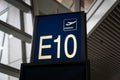 Airport Boarding gate number sign board in departure area Royalty Free Stock Photo