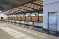 Airport check in counter, lcd screens have clipping path, airport terminal