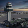Airport control tower features prominently with a panoramic view of runways and Royalty Free Stock Photo