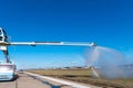 Airport deicing machine perform spraying training for operators. Rainbow on sprayed deicing solution Royalty Free Stock Photo