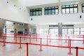 Airport departure and arrivals interior of baggage check in building with no people in the queue Royalty Free Stock Photo