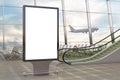 Airport departure lounge. Blank billboard stand and airplane on background. Royalty Free Stock Photo