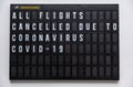 Airport Departures Board COVID-19 Coronavirus Flights Cancelled Royalty Free Stock Photo