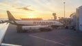 An airplane parked for boarding at Henri Coanda International Airport