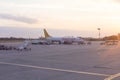 An airplane parked for boarding at Henri Coanda International Airport