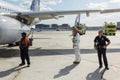 Airport emergency personnel on tarmac