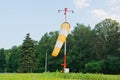 Airport equipment near a forest Royalty Free Stock Photo