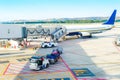 Airport, gangway, airplane, luggage, loader Royalty Free Stock Photo