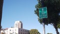 Airport green road sign, direction arrow, plane icon, San Diego, California USA.
