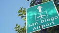 Airport green road sign, direction arrow, plane icon, San Diego, California USA. Royalty Free Stock Photo