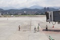 Airport ground service await aircraft approaching with jet brid