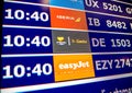 Airport information board close-up in modern Spanish Europe Airp