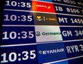 Airport information board close-up in modern Spanish Europe Airp