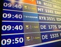 Airport information board close-up in modern Spanish Europe Airp