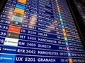 Airport information board close-up in modern Spanish Europe Airp