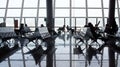 Airport interior large glass window and people