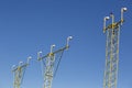 Airport landing lights  on a sunny day. Royalty Free Stock Photo