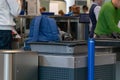 Airport, munich, germany, 2019 april 09: blue backpack at security control point at the airport Royalty Free Stock Photo