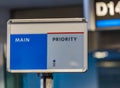 Airport priority seating sign Royalty Free Stock Photo