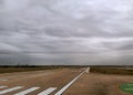 Airport runway with directional signs Royalty Free Stock Photo