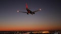 Airport runway lights at night, plane or airline landing to airstrip at sunset. Royalty Free Stock Photo