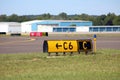 Airport runway signs hangars airfield Royalty Free Stock Photo