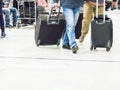 Airport rush. people with their suitcases walking along a corridor Royalty Free Stock Photo