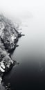 Misty Gothic Winter: Aerial Black And White Photography Of Frozen River And Rocks