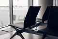 Airport Seating. Empty bench chairs in the departure hall Royalty Free Stock Photo