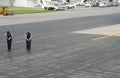 Airport staff bowing as plane leaves, Naha airport, Okinawa, Japan