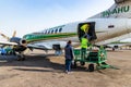 Airport staff clears luggage from the plane of Yeti Airlines in Kathmandu