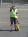 Airport staff on the runway