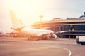 The airport terminal, airplane nearby waiting for boarding passengers Royalty Free Stock Photo