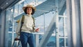 Airport Terminal: Beautiful Smiling Black Woman Holds Ticket, Walks Through in Airline Hub to the Royalty Free Stock Photo