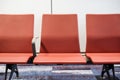 Airport terminal, empty waiting chairs Royalty Free Stock Photo