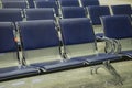 Airport terminal, empty waiting chairs near gate Royalty Free Stock Photo