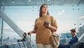 Airport Terminal: Happy Traveling Caucasian Woman Waiting at Flight Gates for Plane Boarding, Uses Royalty Free Stock Photo