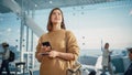 Airport Terminal: Happy Traveling Caucasian Woman Waiting at Flight Gates for Plane Boarding, Uses Royalty Free Stock Photo