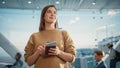 Airport Terminal: Happy Traveling Caucasian Woman Waiting at Flight Gates for Plane Boarding, Uses Royalty Free Stock Photo