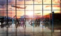 Double exposure airport terminal at sunset with passengers Royalty Free Stock Photo